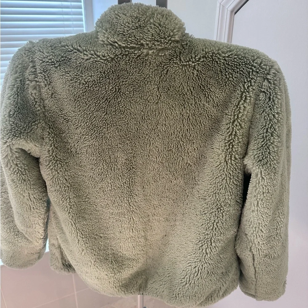 The North Face Girls Reversible Mossbud Swirl Jacket in Green Size Youth M